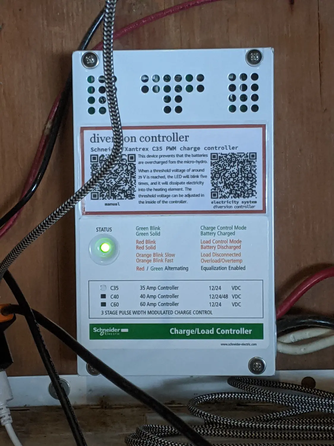 A description label with a QR code on an electrical component