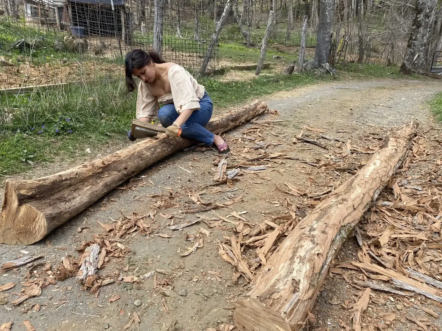 Me debarking a log